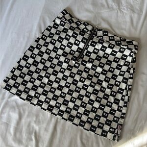 Lazy Oaf x Vans checker print skirt with zipper and o-ring. ⬛️⬜️⬛️⬜️